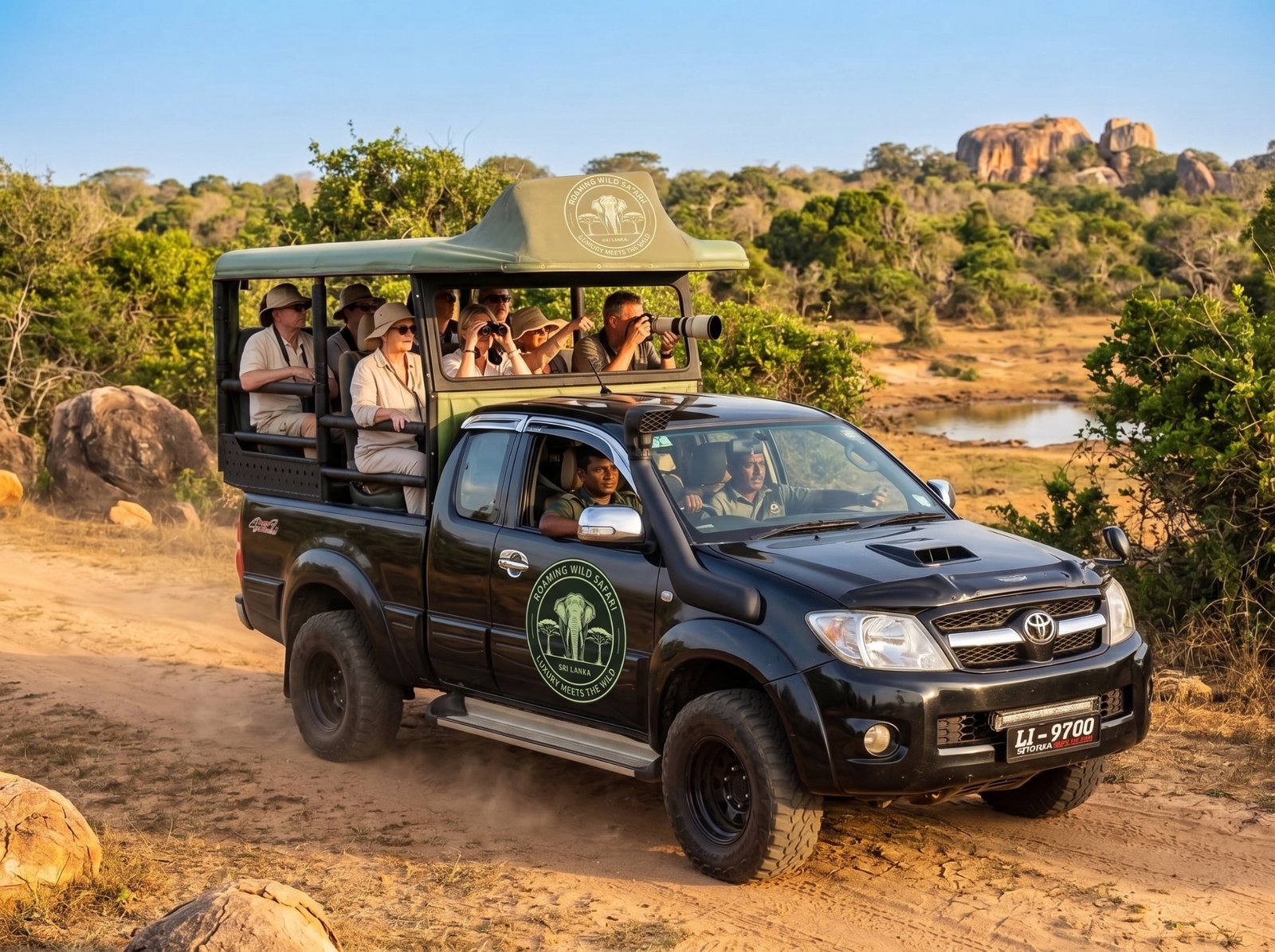 Tourists photographing wildlife from a Roaming Wild Safari jeep in Yala