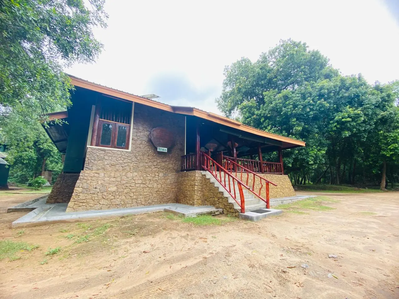Stone exterior and entrance veranda of Warahana Wildlife Circuit Bungalow